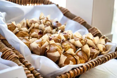 a basket of pastries sitting on a table at Coast Discovery Inn in Campbell River