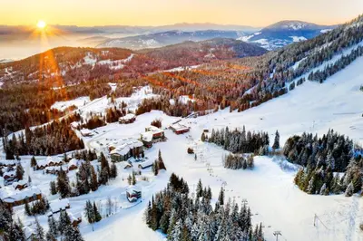 an aerial view of a ski resort in the snow at The Josie Hotel, Autograph Collection in Rossland