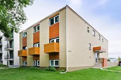 a building with balconies on the side of it at M Lofts in Calgary
