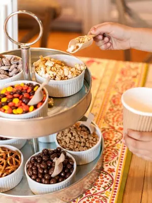a tray of different types of food on a table at Vegreville Suites in Vegreville