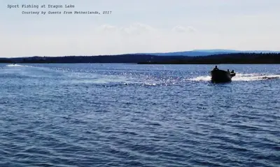 a boat in a large body of water at Caravan INN in Quesnel