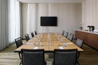 a large conference room with a long table and chairs at Courtyard by Marriott Prince George in Prince George