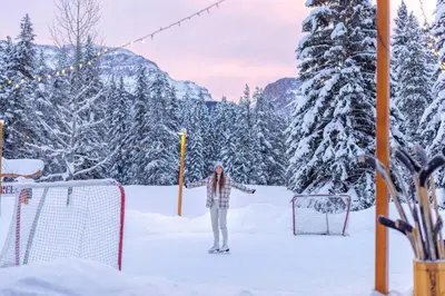 a person standing in the snow near a goal at Baker Creek By Basecamp in Lake Louise