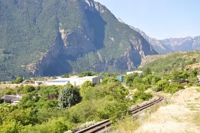 a small town in front of a mountain at Canadas Best Value Inn Mile-0-Motel Lillooet in Lillooet