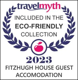 a logo for an event with an apple in a wreath at Fitzhugh House Guest Accomodation in Jasper