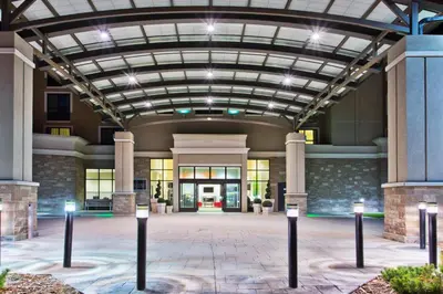 a large building with a glass ceiling with lights at Holiday Inn Hotel & Suites Red Deer by IHG in Red Deer