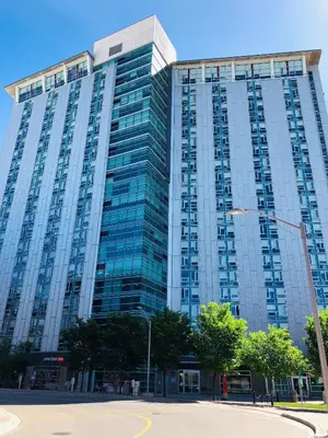 a large office building with a lot of windows at SAIT Residence & Conference Centre - Calgary in Calgary