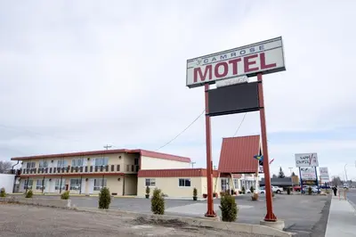 a motel sign in front of a building at Camrose Motel in Camrose