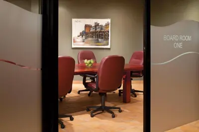 a conference room with a table and chairs at Red Deer Resort & Casino in Red Deer