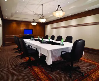 a conference room with a long table and chairs at Red Deer Resort & Casino in Red Deer