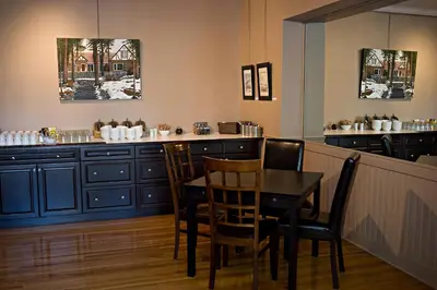 a dining room with a table and chairs at Banff Boutique Inn - Adults only in Banff