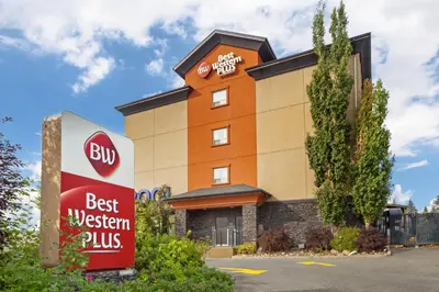 a building with a best western plus sign in front of it at Best Western Plus St Albert in St. Albert