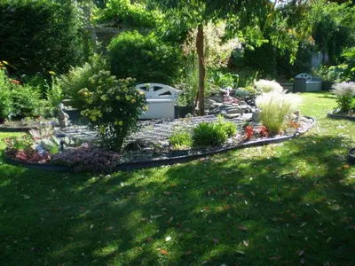 a garden with a variety of plants and flowers at Island View B&B in Nanaimo