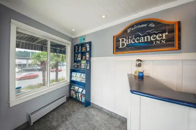 a sign for the bicheno inn next to a window at Buccaneer Inn in Nanaimo