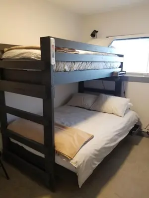 a couple of bunk beds in a room at The Ranch Highway 55 in Debden