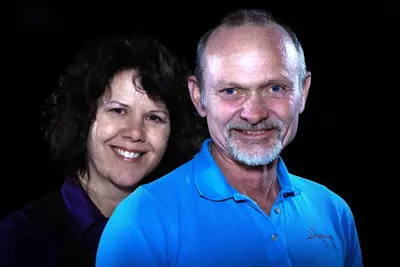 a man and a woman posing for a picture at Windborne Bed & Breakfast in Castlegar