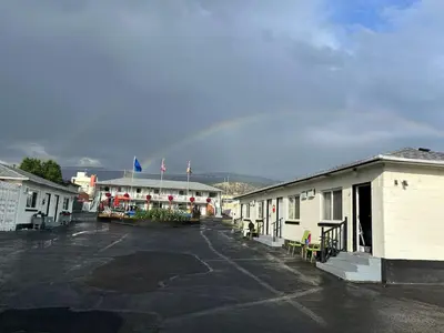 a group of buildings in a parking lot at 5000 Motel in Penticton