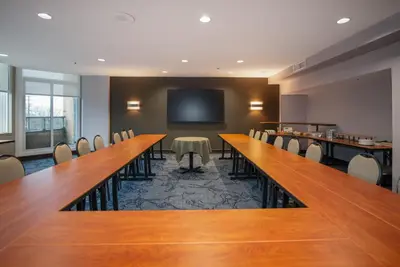 a conference room with a long table and chairs at Coast Bastion Hotel in Nanaimo