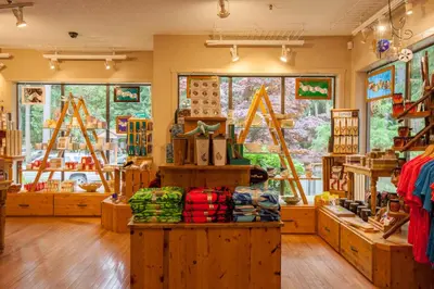 a store with wooden counters in a room with windows at Tigh-Na-Mara Seaside Spa Resort in Parksville