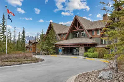 a large house with a road in front of it at WorldMark Canmore-Banff in Canmore