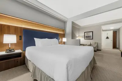 a large white bed in a hotel room at Best Western Plus Revelstoke in Revelstoke