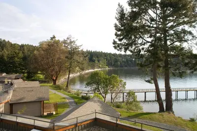 a view of a lake from a house at Mayne Island Resort in Mayne Island