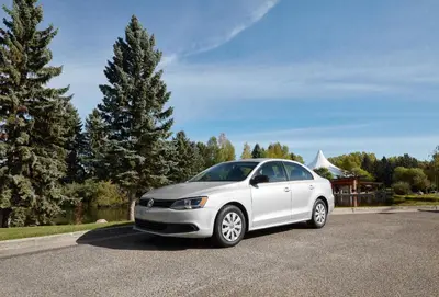 a white car parked in a parking lot at 5 STAR Business Luxury Homeshare in Edmonton
