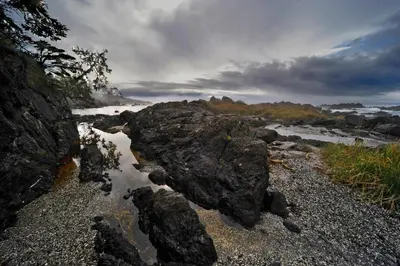 a large rock on the side of a river at Black Rock Oceanfront Resort in Ucluelet