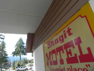 a sign on the side of a building at Skagit Motel in Hope