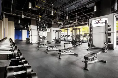 a gym with rows of chairs and machines at JW Marriott Edmonton ICE District in Edmonton