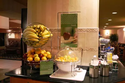 a display of fruit on a counter in a store at Hampton Inn & Suites by Hilton Calgary University NW in Calgary