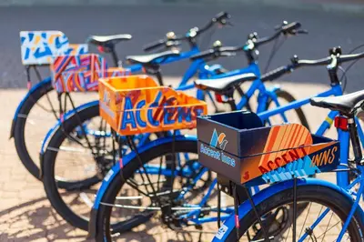 a group of blue bikes parked next to each other at Accent Inns Kamloops in Kamloops