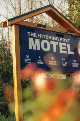 a sign for the hitchiking post mortet motel at The Hitching Post Motel in Pemberton