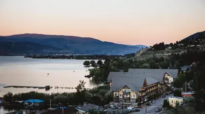 an aerial view of a town next to a body of water at Summerland Waterfront Resort & Spa in Summerland