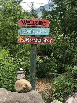 a sign that says welcome to brunel island and a morning star at Morning Star Cabin in Nelson