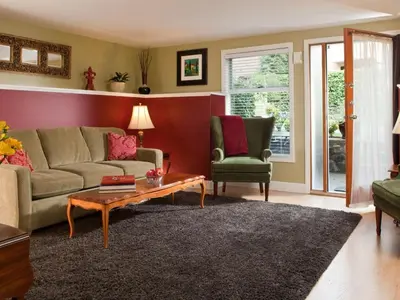 a living room with a couch and a coffee table at Abbeymoore Manor in Victoria
