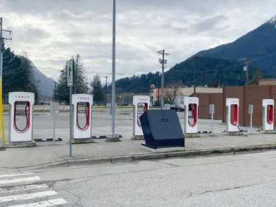 a row of red and white gas stations on a street at Slumber Lodge in Hope