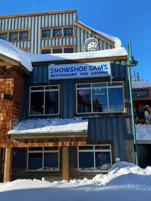 a snowshoe seminars restaurant in the snow at 3 BR 3 Bath ski in ski out with private hot tub in Big White
