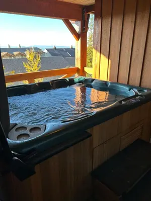 a jacuzziificialificialificialificialificialificialificialificialificialificialificial at 3 BR 3 Bath ski in ski out with private hot tub in Big White