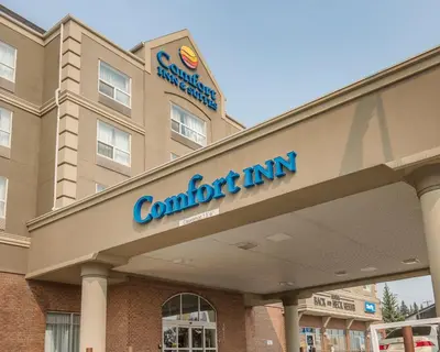 a rendering of a hotel with a sign for a comfort inn at Comfort Inn & Suites South in Calgary