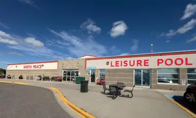 a store with a sign that reads leisure pool at Coast Fort St John Hotel in Fort Saint John
