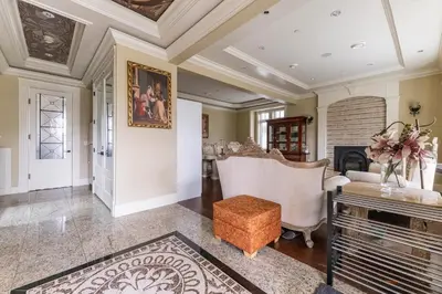 a living room with a couch and a fireplace at Mike's Luxury House in Vancouver