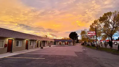 an empty parking lot in front of a motel at Prince Motel in Prince George