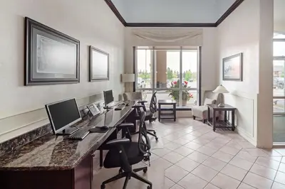 a office with a desk with a computer on it at Best Western High Road Inn in Edson