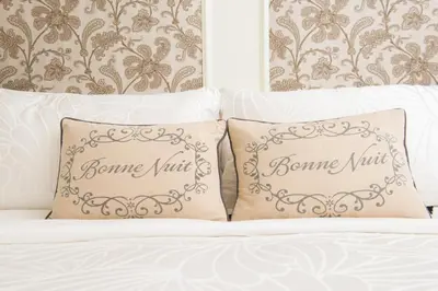 two pillows sitting on top of a bed at The Craigmyle Inn in Victoria