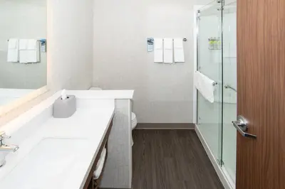 a bathroom with a sink and a shower at Holiday Inn Express & Suites - North Battleford by IHG in North Battleford
