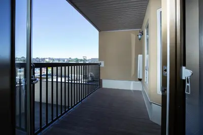 a balcony with a view of a city at Pomeroy Hotel Fort St. John in Fort Saint John