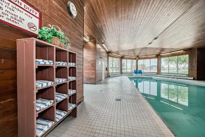 a pool room with a swimming pool at Stony Plain Inn & Suites in Stony Plain