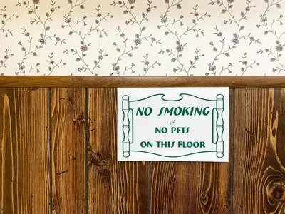 a no moving sign on a wooden fence at Valhalla Inn in New Denver