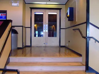 a staircase leading to a door in a building at The Yukon Inn in Whitehorse